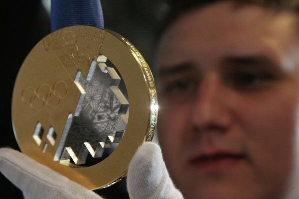 Sochi 2014 Olympic Medal Set Unveiled in Russia - Sputnik International