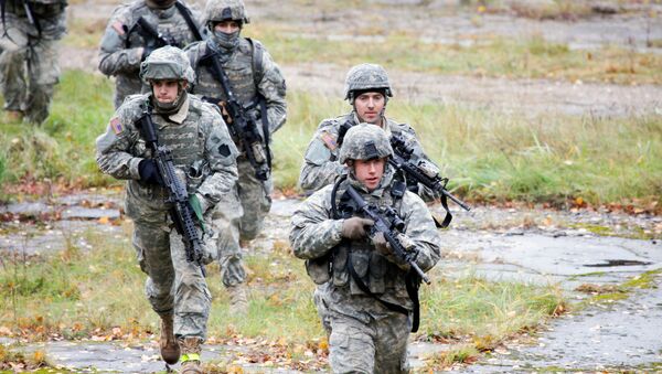 US Soldiers take part in a cordon and search exercise at the Adazi Training Area, Latvia (File photo) - Sputnik International