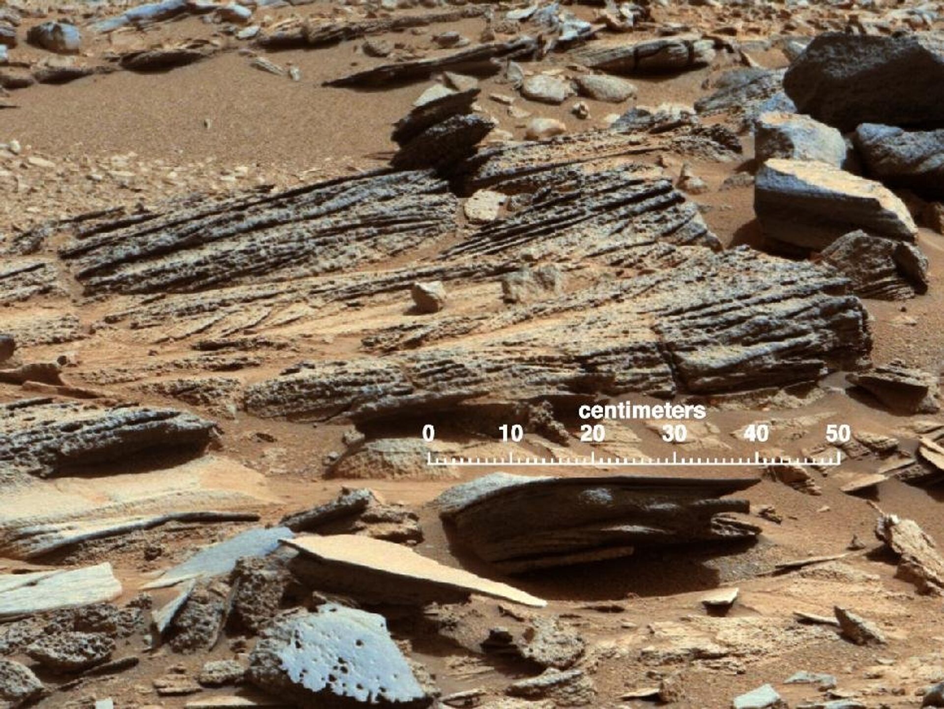 NASA scientists say these rocks in Gale Crater indicate a stream once flowed in this part of Mars.  - Sputnik International, 1920, 19.01.2022