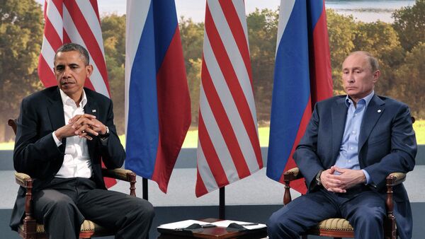 US President Barack Obama meets with Russian President Vladimir Putin during the G8 Summit in Northern Ireland on June 17. They will be seen together again at the G20 Summit in Russia on Thursday. - Sputnik International