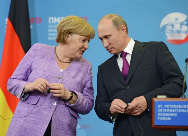 Russian President Vladimir Putin and German Chancellor Angela Merkel (Archive) - Sputnik International