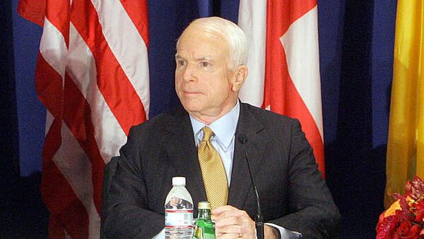 John McCain also accused Putin of having a “disdain for democracy and the things we stand for and believe in.” - Sputnik International