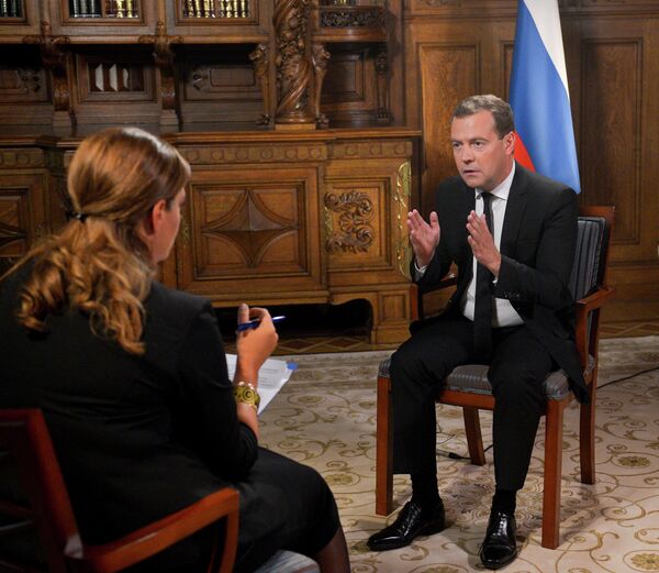 Russian Prime Minister Dmitry Medvedev gestures during an interview with Georgia’s Rustavi-2 television channel - Sputnik International