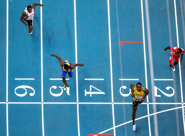 Bolt Charges to World 100m Gold in Moscow - Sputnik International