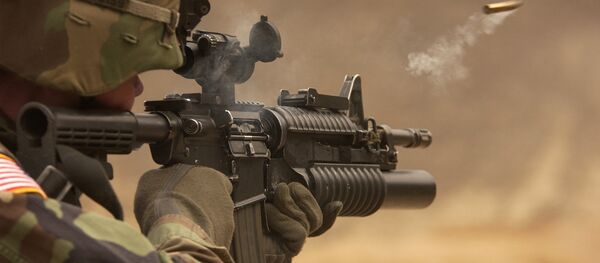 A US Army soldier fires an M-4 rifle (File photo) A US Army soldier fires an M-4 rifle (File photo) - Sputnik International