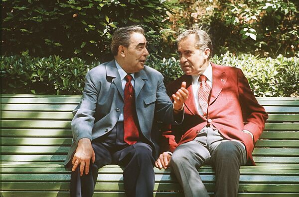 Former Soviet leader Leonid Brezhnev and former US President Richard Nixon chat on a bench in Crimea in 1974. - Sputnik International