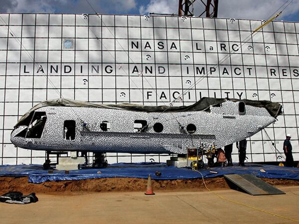 The former Marine helicopter's fuselage was painted in black polka dots as part of a high-speed photo technique. - Sputnik International