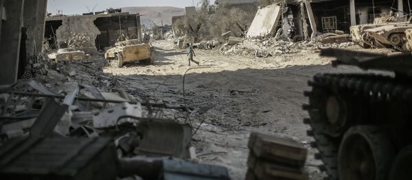 In August 2013, an unprecedented chemical attack which killed nearly 1,500 civilians took place in Ghouta, a suburb of the Syrian capital Damascus. Militants and the Syrian government blamed each other for the attack. - Sputnik International