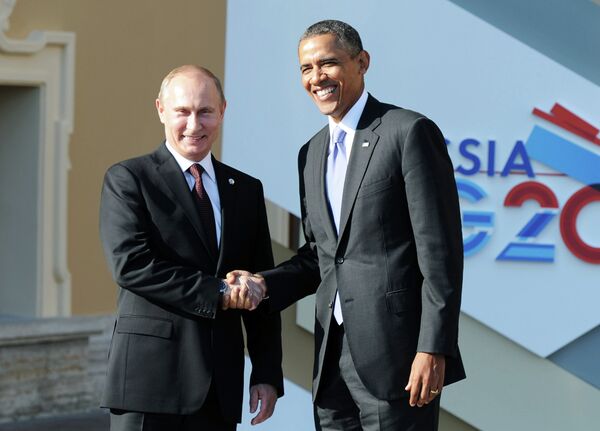 Russian President Vladimir Putin and US President Barack Obama pictured at the G20 Summit in St. Petersburg - Sputnik International