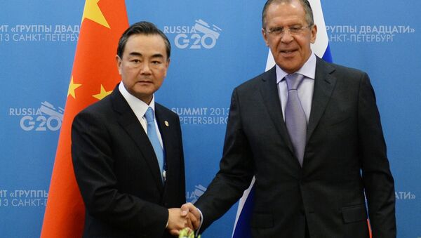 Chinese Foreign Minister Wang Yi (on the lest) and his russian counterpart Sergey Lavrov - Sputnik International