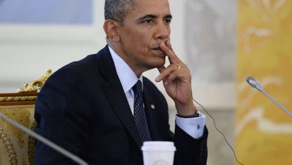 US President Barack Obama listens at a G20 meeting in St. Petersburg, Russia, on Friday. - Sputnik International