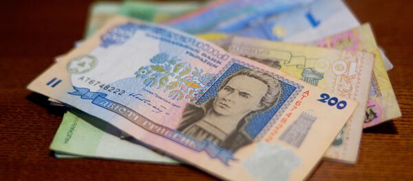 The authorities of the self-proclaimed Donetsk People's Republic (DPR) are considering introducing a currency to replace the hryvnia on its territory - Sputnik International