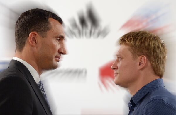 Wladimir Klitschko (left) and Alexander Povetkin (right) at a press-conference - Sputnik International