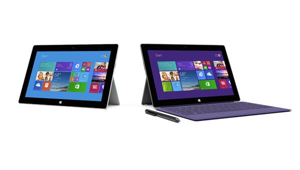 The Surface Pro 2, seen here as a tablet and laptop, is slimmer and faster than its predecessor. - Sputnik International