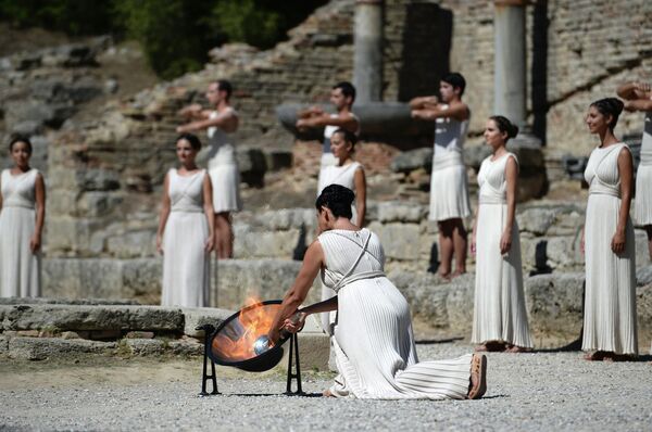 Flame Lit for Sochi Winter Games in Ancient Olympia - Sputnik International