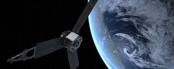An artist’s rendition shows NASA’s Juno spacecraft as it picks up a gravity-assisted speed boost that will slingshot it into space, toward Jupiter. An artist’s rendition shows NASA’s Juno spacecraft as it picks up a gravity-assisted speed boost that will slingshot it into space, toward Jupiter. - Sputnik International
