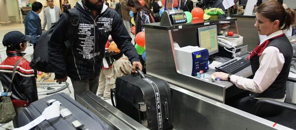 The check-in counter at the Sheremetyevo International Airport - Sputnik International