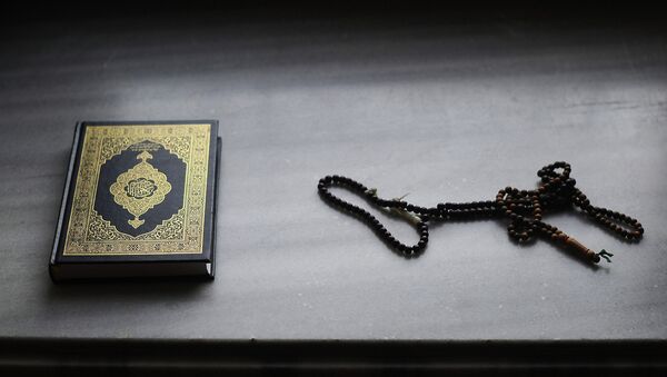 Koran and beads - Sputnik International