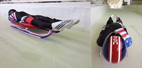 The new USA Luge design has a sleek black racing suit with American flag symbols on the right shoulder and side. - Sputnik International