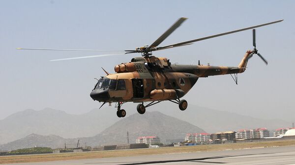 An Afghan Mi-17 helicopter takes off for an air-assault training flight from Kabul International Airport, Afghanistan - Sputnik International