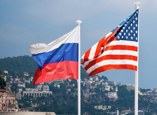 Flags of Russia and the US - Sputnik International