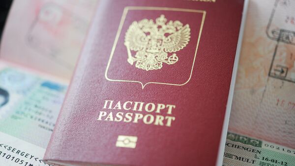 Schengen visa and Russian foreign travel passport - Sputnik International