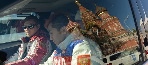 Russia's Olympic champion Viktor An (R) in a car presented to the medalists - Sputnik International