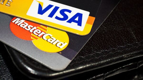 Visa, Mastercard Freeze Customer Cards at Russian Bank - Sputnik International