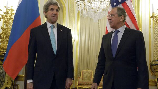 Russian Foreign Minister Sergei Lavrov, right, and US Secretary of State John Kerry at their meeting at the Russian Ambassador's residence in Paris. - Sputnik International