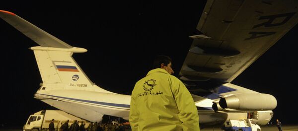 Russian plane with humanitarian aid in Latakia Airport in Syria (Archive) - Sputnik International