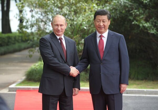 Russian President Vladimir Putin and Chinese President Xi Jinping - Sputnik International