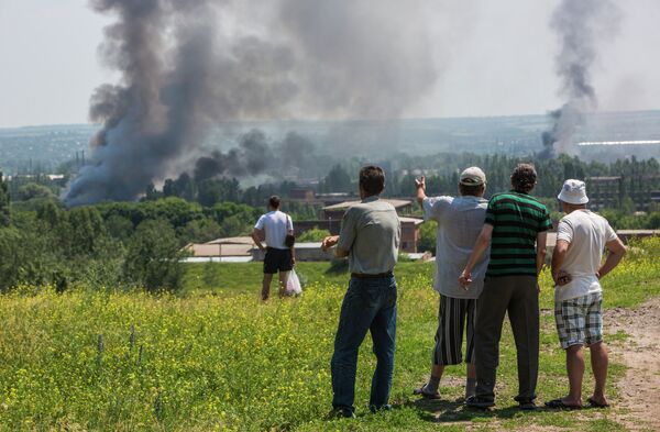 Residents of Slaviansk during a heavy artillery shelling of their city - Sputnik International