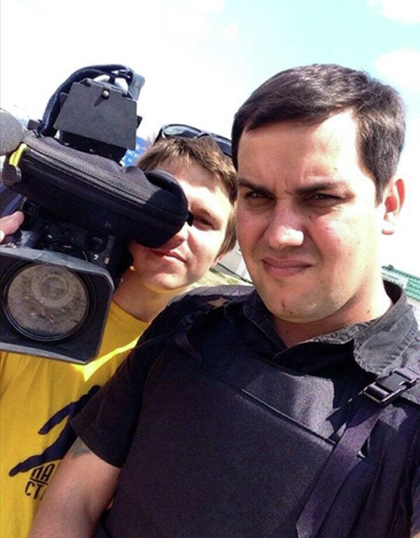 Reporter Denis Kulaga and cameraman Vadim Yudin - Sputnik International