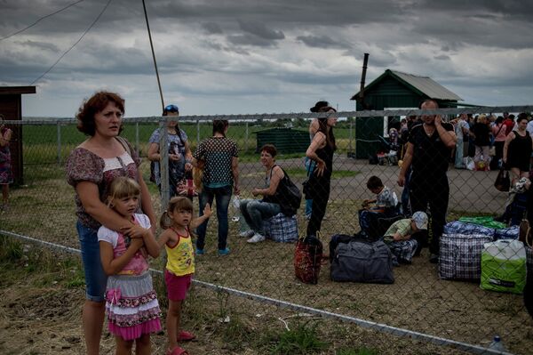 Ukrainian refugees in Lugansk region (Archive) - Sputnik International
