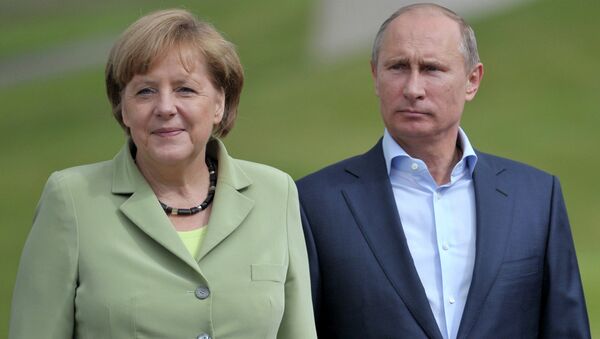 Russian President Vladimir Putin and German Chancellor Angela Merkel (Archive) - Sputnik International