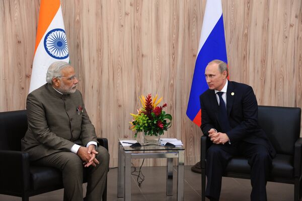 Russian President Vladimir Putin and Indian Prime Minister Narendra Modi during a meeting in Fortaleza - Sputnik International