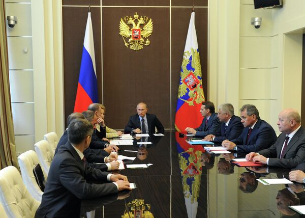 Russian President Vladimir Putin at a meeting of  Russia's Security Council on May 19,2014. - Sputnik International