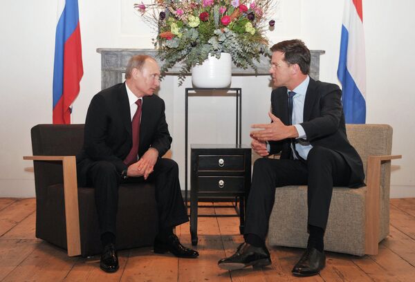 Russian President Vladimir Putin and Dutch Prime Minister Mark Rutte - Sputnik International