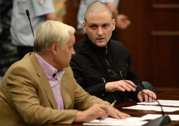 Opposition leader Sergei Udaltsov, right, charged with organizing mass riots at the Moscow City Court hearing on the merits of Udaltsov and Razvozzhayev's criminal case - Sputnik International