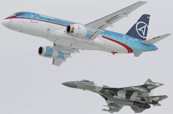 The Sukhoi SuperJet-100 (above) and the Sukhoi Su-35 multirole air superiority fighter - Sputnik International