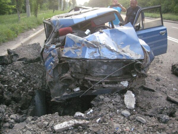 Car shelled in Donetsk - Sputnik International