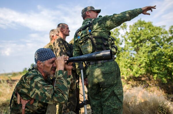 Militiamen in Donetsk Region in southeastern Ukraine. - Sputnik International