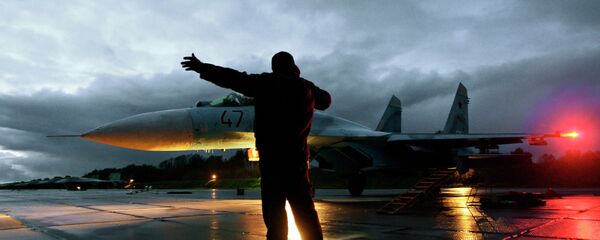 Flying Su-27 fighters in the Kaliningrad region Flying Su-27 fighters in the Kaliningrad region - Sputnik International