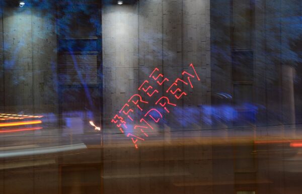 Laser Hashtags Projected on Rossiya Segodnya Building in Support of Andrei Stenin - Sputnik International