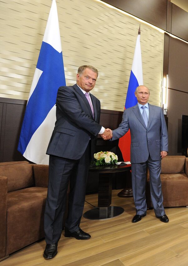 Finnish President Sauli Niinisto (left) and Russian President Vladimir Putin (right) - Sputnik International