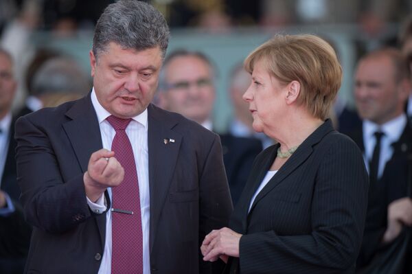 Ukrainian President Petro Poroshenko and Germany’s Chancellor Angela Merkel. - Sputnik International