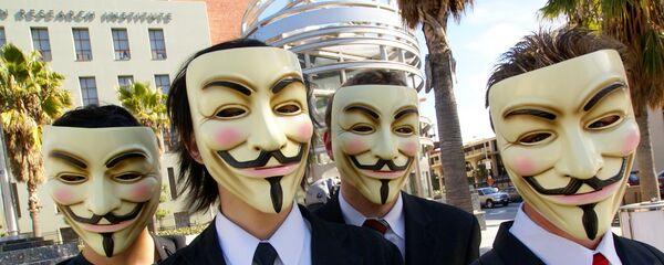 Anonymous with Guy Fawkes masks at the Scientology area in Los Angeles - Sputnik International