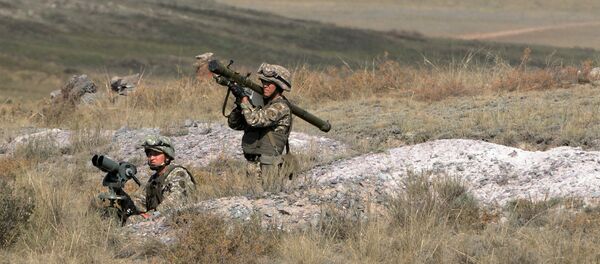 A soldier with a man-portable air-defense system during military exercises. A soldier with a man-portable air-defense system during military exercises. - Sputnik International