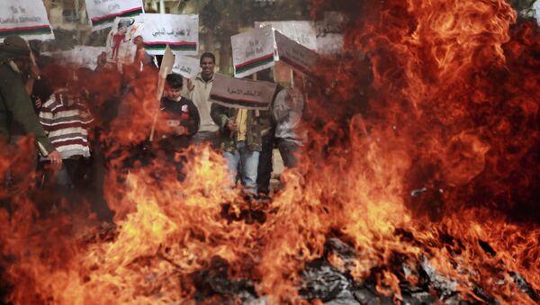 Benghazi residents burn portraits of Muammar Gaddafi - Sputnik International