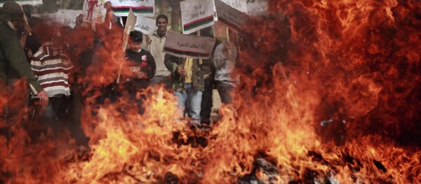 Benghazi residents burn portraits of Muammar Gaddafi - Sputnik International